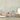 Children's room with dolls, toys, and decorative elements on a textured wall background